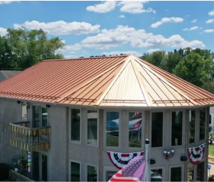 Ridge and trim detail on a Smokey Row metal roof